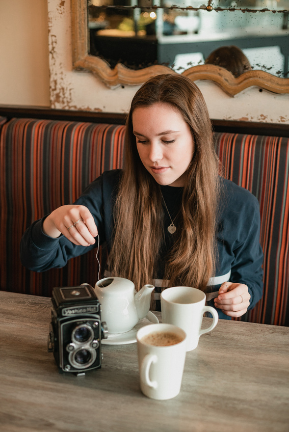 Person Holding Teabag